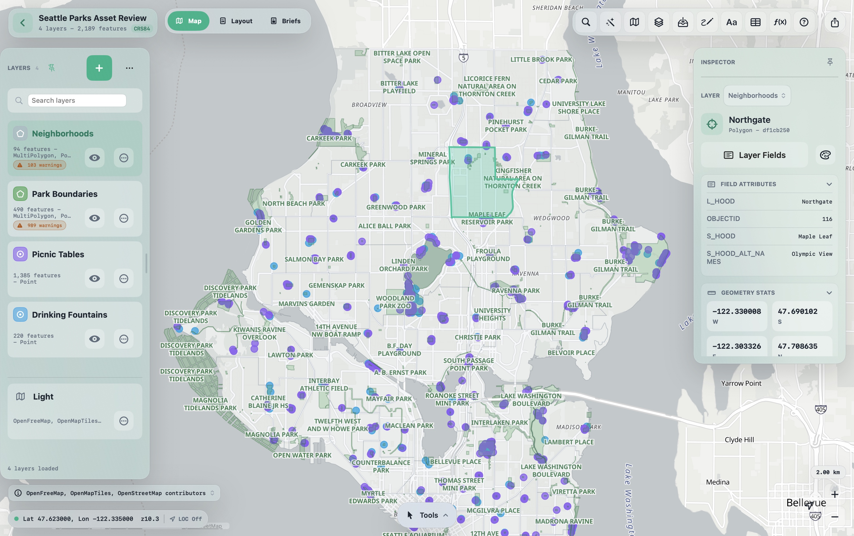 Meridian on Mac with the Seattle Parks Asset Review open, showing neighbourhood, park boundary, picnic table, and drinking fountain layers over the map, with the selected Northgate neighbourhood and its attributes in the Inspector.